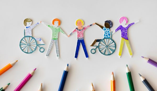 fullhd_multi-ethnic-disabled-people-community-with-pencils